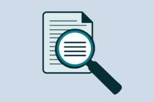Illustration of a printed document with a magnifying glass above the page